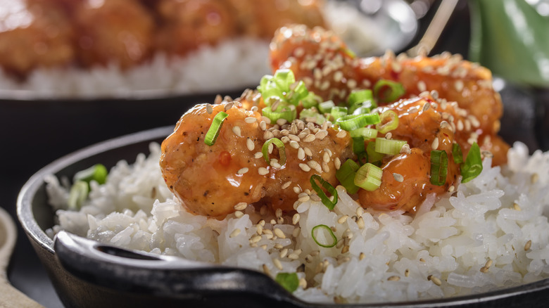 crispy orange chicken professionally plated