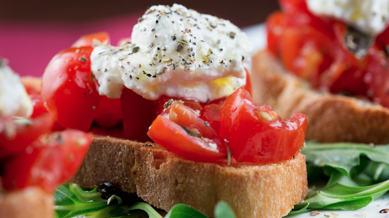 Crostini drizzled with olive oil