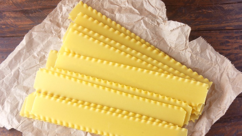 A stack of lasagna sheets on a table. 