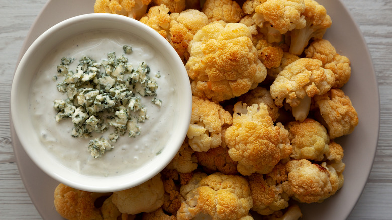 Roasted Homemade Baked Buffalo Cauliflower Wings with Blue Cheese.