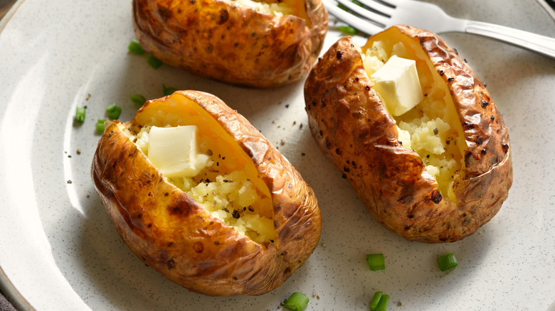 Baked potatoes with butter
