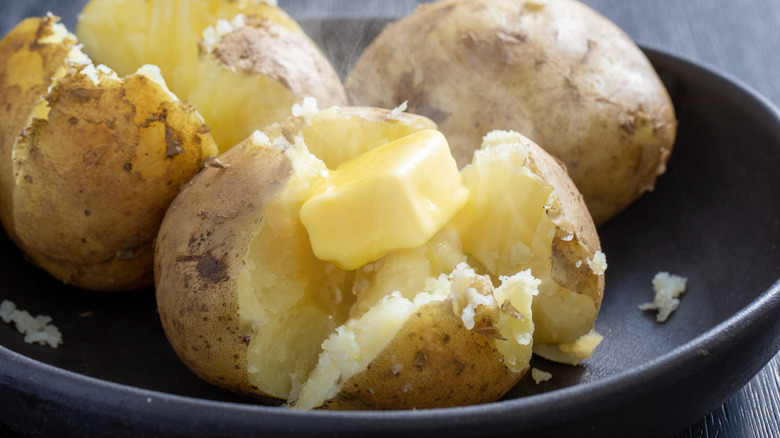 Close-up baked potato with butter