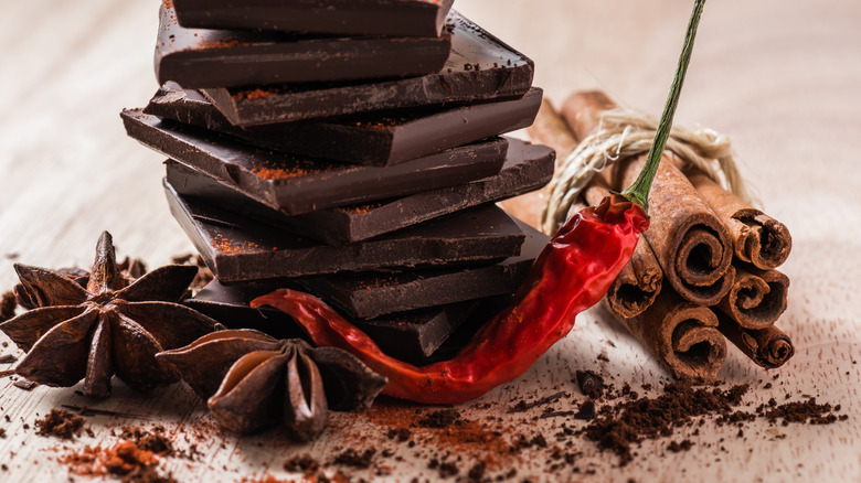 Peppers, star anis, cinnamon, and chocoalte