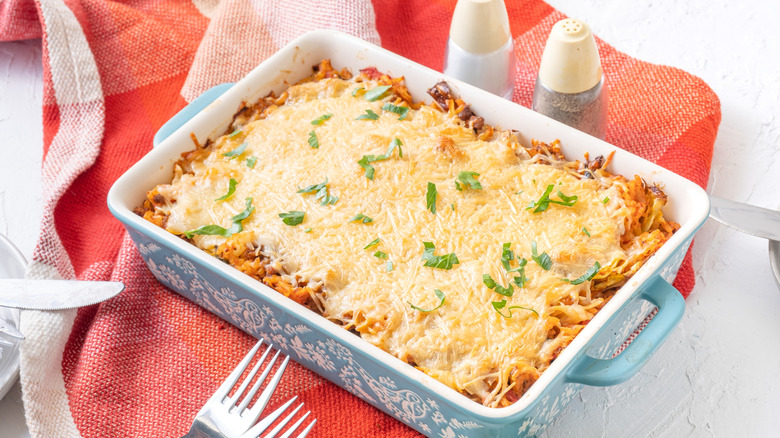 A cheese-topped baked cabbage meal in a casserole dish