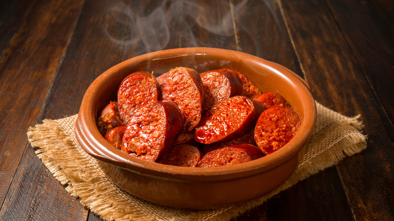 Tapas bowl containing sliced chorizo