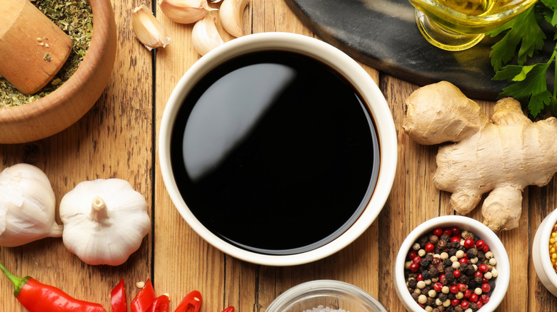Soy sauce on a wooden table.