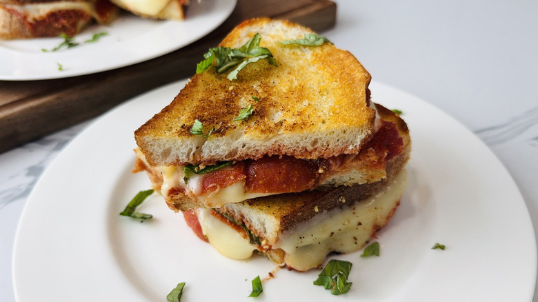 Pepperoni pizza grilled cheese on plate