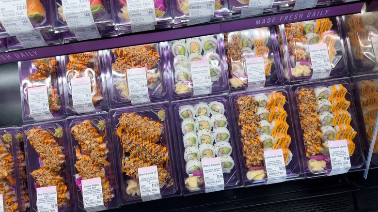 packages of sushi at grocery store