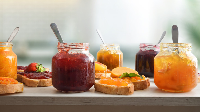 Jams and jellies of various flavors with bread