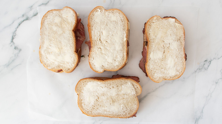 Sandwiches with buttered bread tops