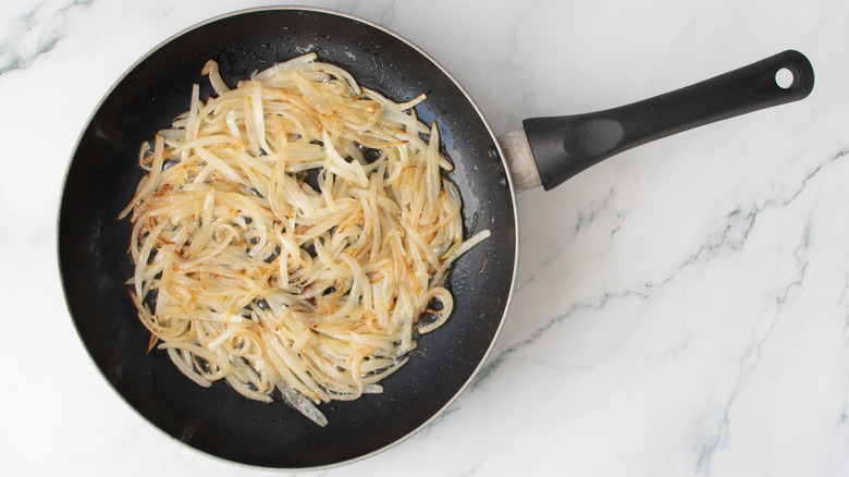 Sauteed onions in skillet