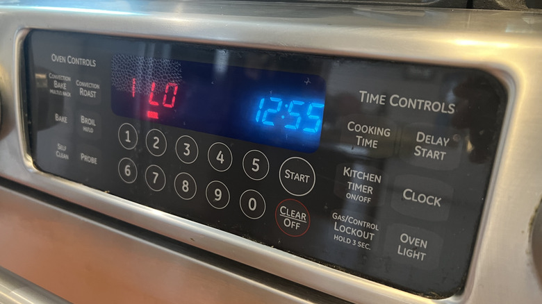 close up of digital oven broil and time display