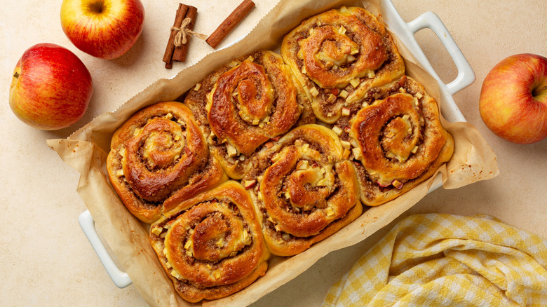 overhead view of cinnamon rolls in a baking dish