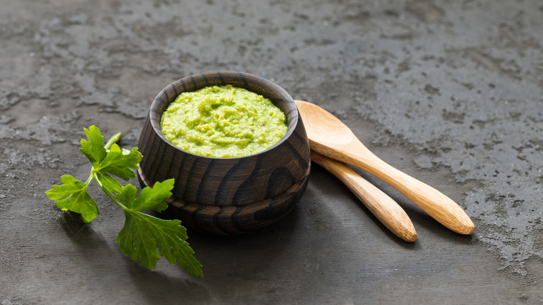 Wasabi paste in a black bowl