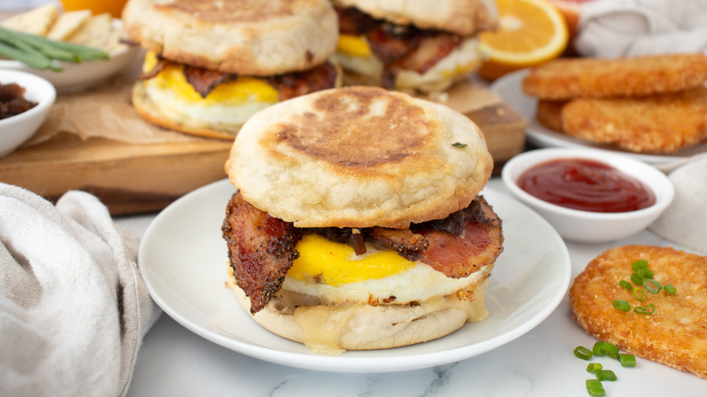 egg and bacon sandwich on an English muffin