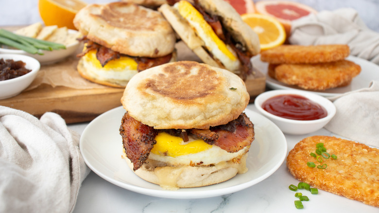 egg and bacon sandwich on an English muffin