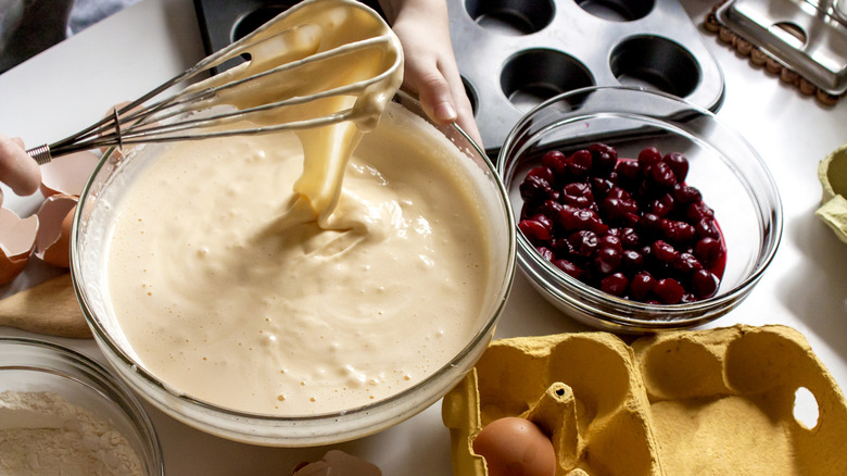 stirring cake mix with whisk