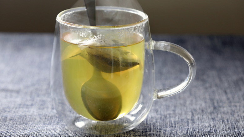 Glass with green tea