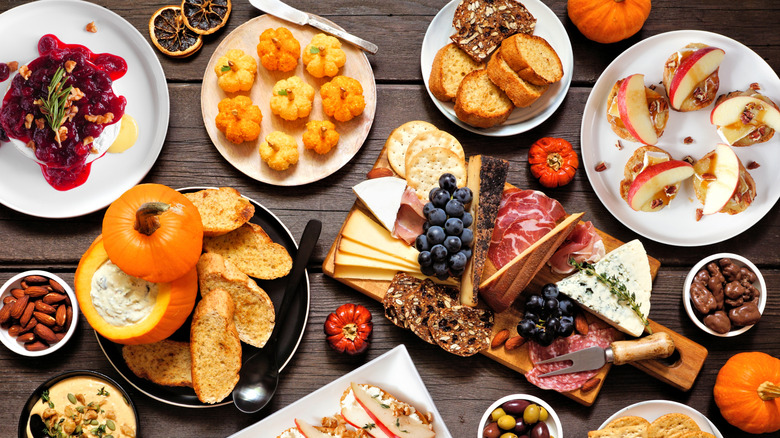 Table spread of fall themed appetizers.