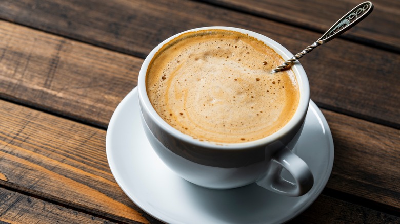 cup of coffee topped with foam