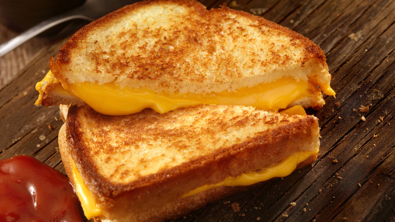 A classic grilled cheese sliced in half.
