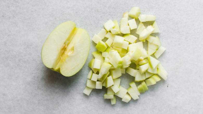 Diced apple with halved apple