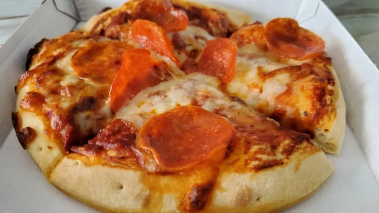 Mini pepperoni pizza from Godfather's Pizza Express with four small slices