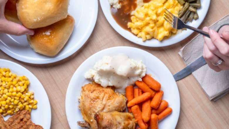 Plates of food filled with various Golden Corral dishes