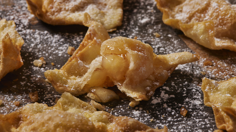 Apple dumplings dusted with powdered sugar