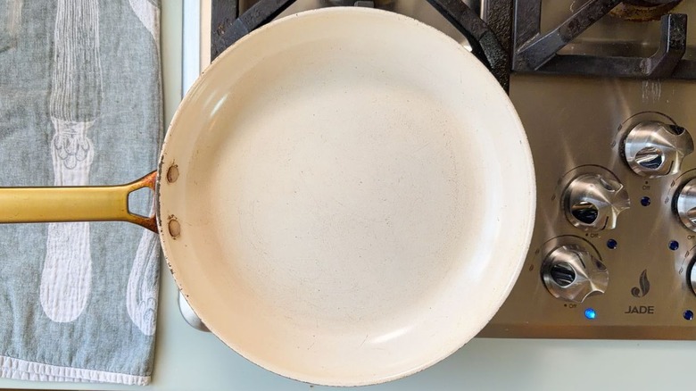 White skillet on stovetop