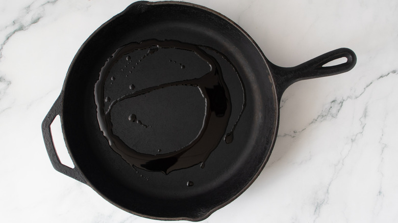 oil in a black frying pan
