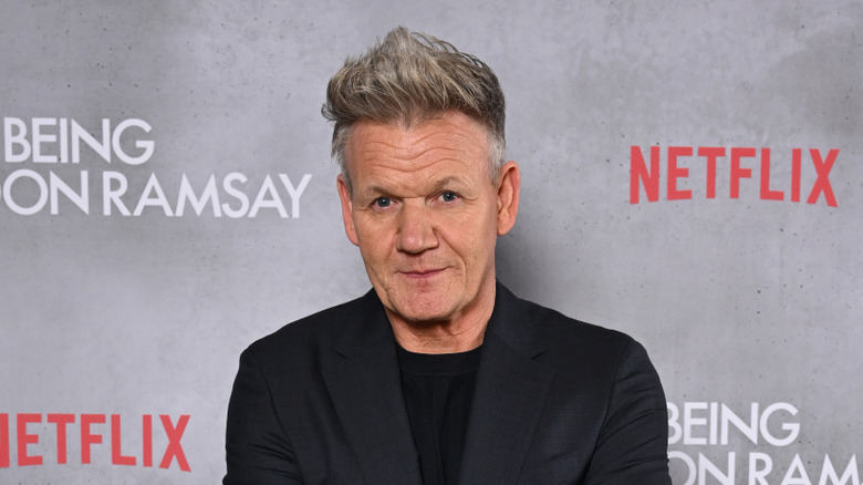 Celebrity chef Gordon Ramsay appears at a red carpet event.