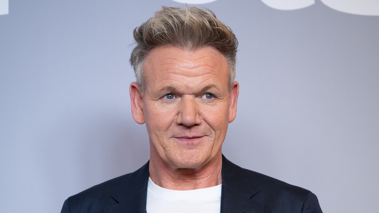 Celebrity chef Gordon Ramsay appears at a red carpet event.