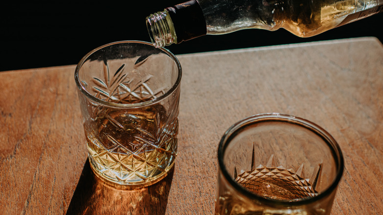 Bourbon being poured into a glass