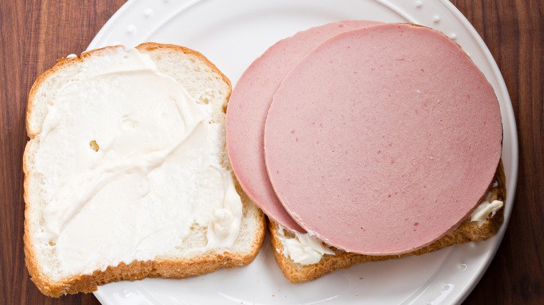 Bologna sandwich on white bread with mayo