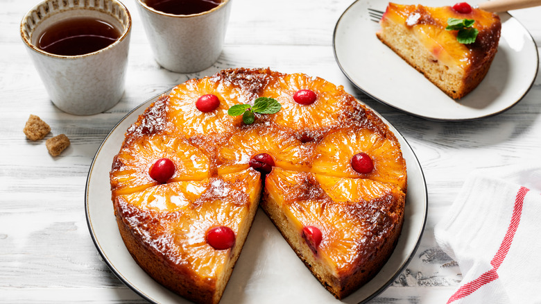 pineapple upside-down cake with coffee and slice