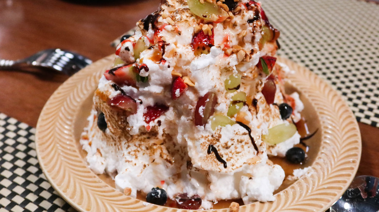 Baked Alaska cake with part out