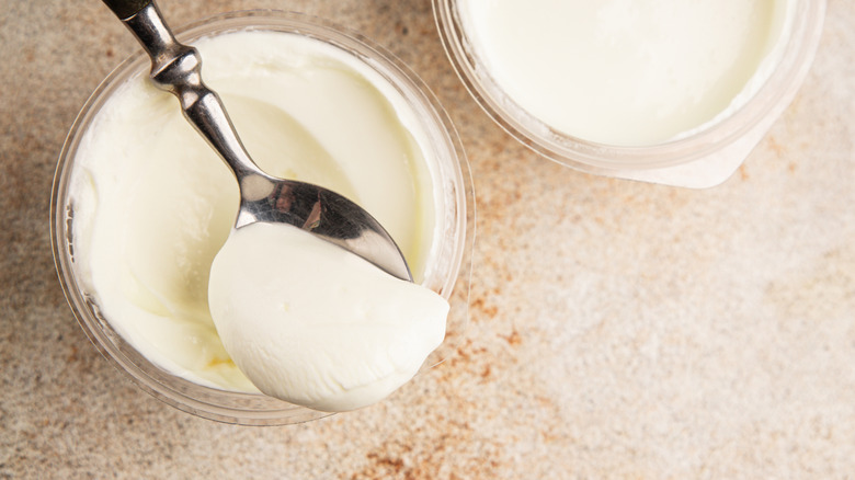 Spoonful of skyr over jar