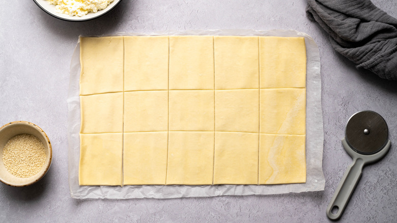 A sheet of puff pastry squares.