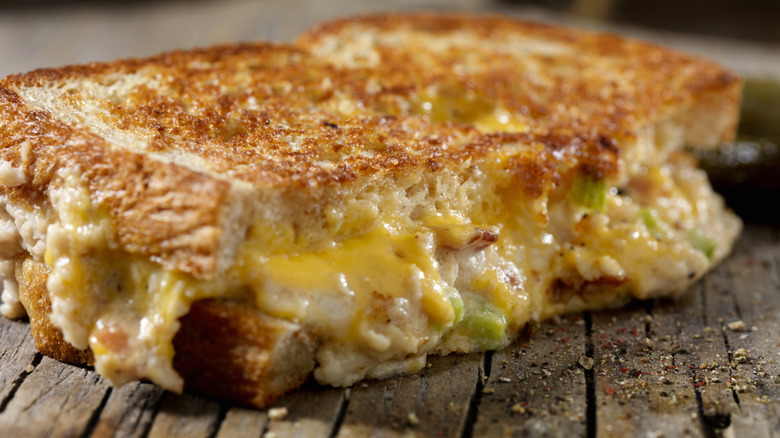 A sliced grilled cheese sandwich