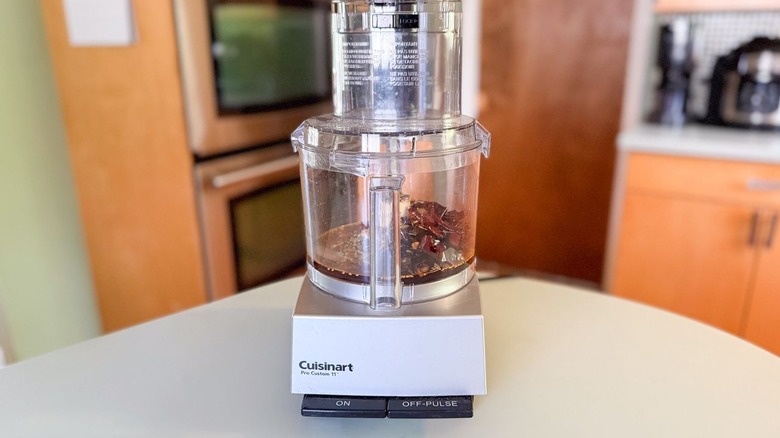 Salsa macha ingredients in food processor bowl
