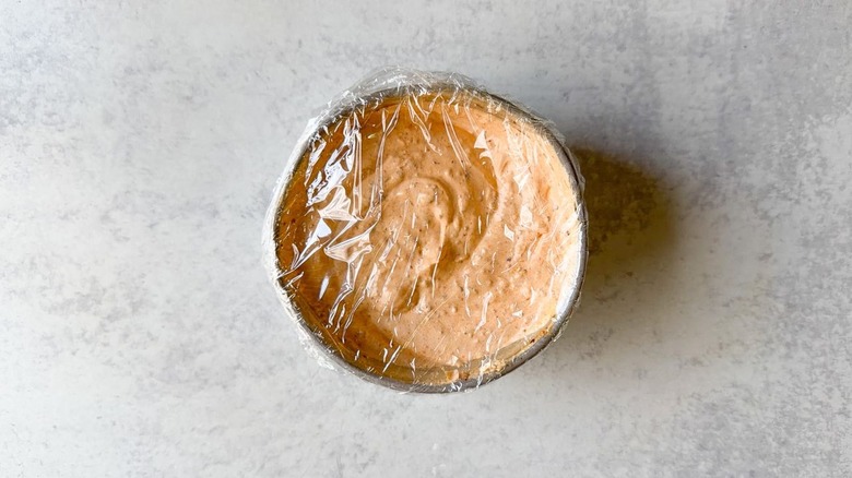 Salsa macha crema in plastic covered bowl