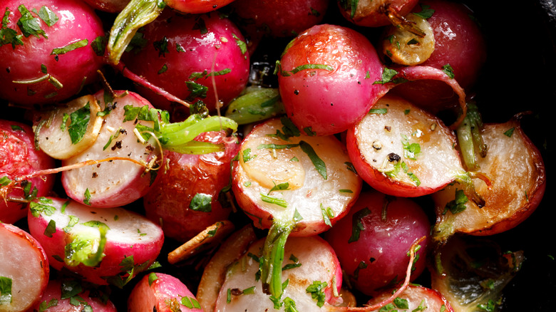 Close-up of grilled radishes with herbs and spices