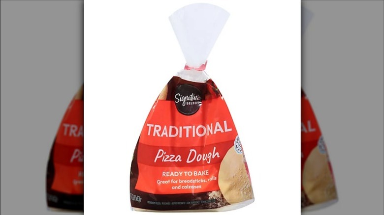 Albertsons Signature Select branded traditional pizza dough inside packaging