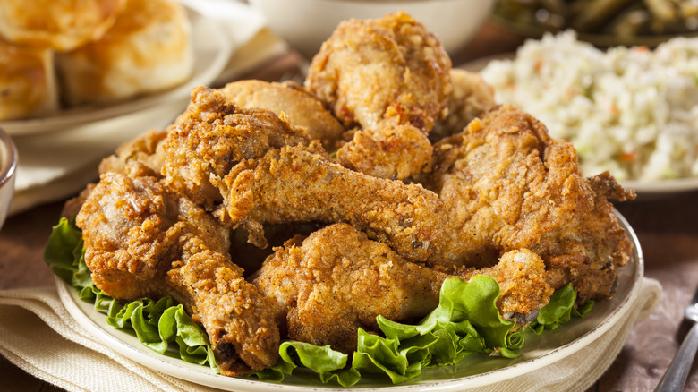A plate of fried chicken on a table