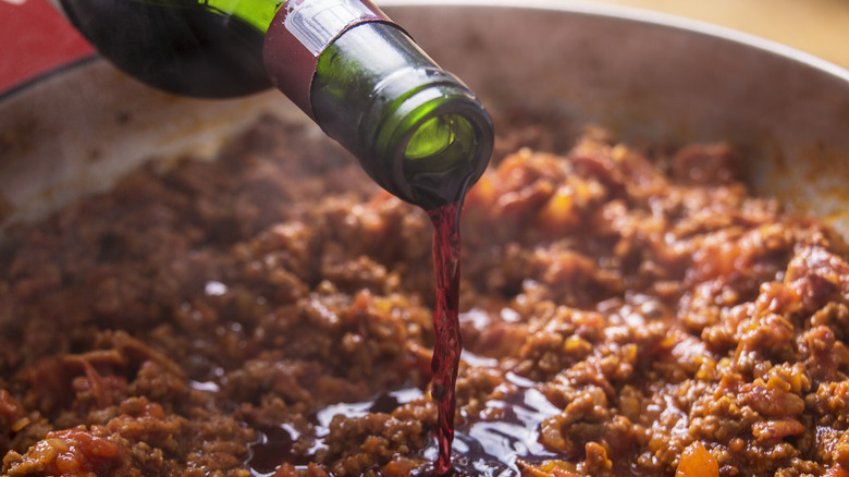 A closeup of wine bottles in a wine rack