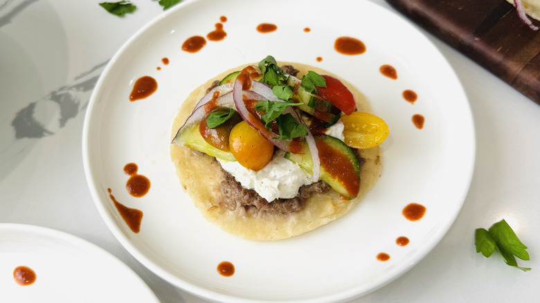 Gyro-style Greek taco on plate