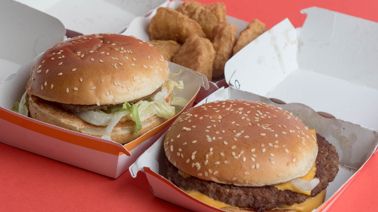 Two McDonald's burgers and chicken nuggets in their containers