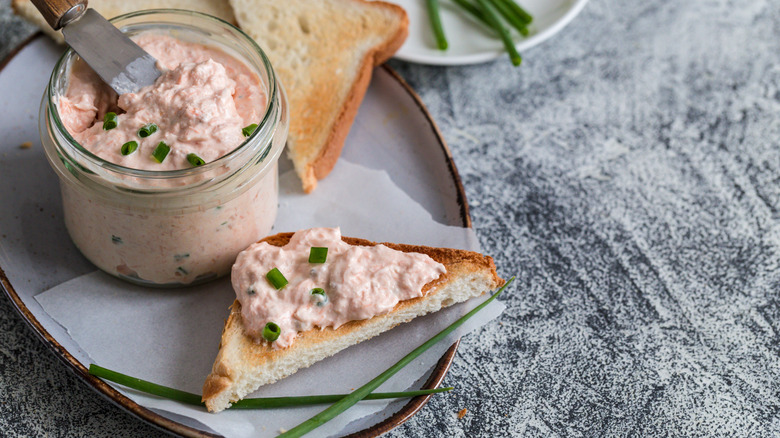 Salmon spread in a jar and on toast