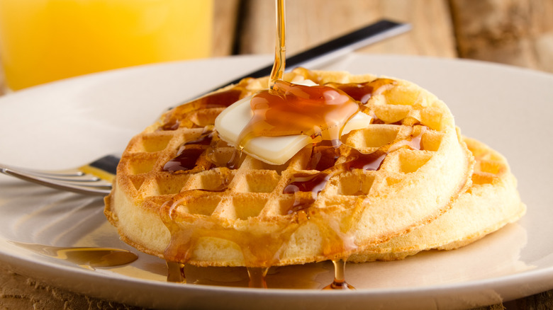 Frozen waffles with butter and syrup